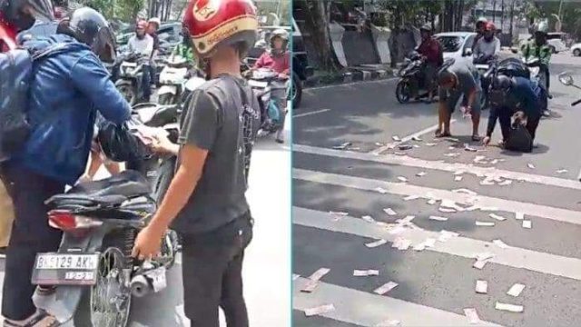 Heboh..!! Hujan Uang Pecahan Rp 100 Ribu Di Medan