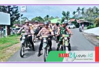 Foto personil Koramil 06/Kerajaan Bersama Personil Polsek Sukaramai saat melaksanakan patroli