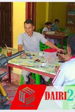 Babinsa Koramil 05/TP Ngopi Santai Bersama Kades dan Warga Desa Kutabuluh